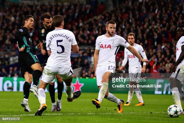 Cristiano Ronaldo of Real Madrid scores his sides first goal during the UEFA Champions League group H match between Tottenham Hotspur and Real Madrid...