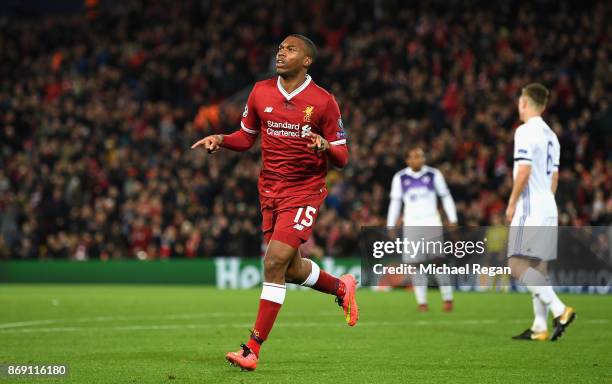 Daniel Sturridge of Liverpool celebrates scoring his sides third goal during the UEFA Champions League group E match between Liverpool FC and NK...