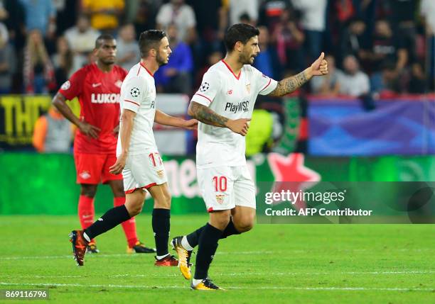 Sevilla's Argentinian midfielder Ever Banega celebrates after scoring a goal during the UEFA Champions League group E football match between Sevilla...