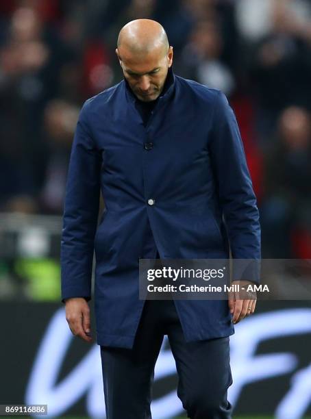 Dejected looking Zinedine Zidane manager / head coach of Real Madrid during the UEFA Champions League group H match between Tottenham Hotspur and...