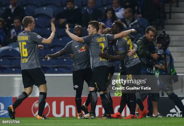 Leipzig forward Timo Werner from Germany celebrates with teammates after scoring a goal during the UEFA Champions League match between FC Porto and...