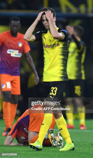 Dortmund's German midfielder Julian Weigl reacts during the UEFA Champions League Group H football match BVB Borussia Dortmund v Apoel Nicosia on...