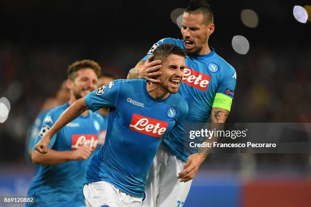 Marek Hamsik and Jorginho of SSC Napoli celebrate the 2-2 goal scored by Jorginho during the UEFA Champions League group F match between SSC Napoli...