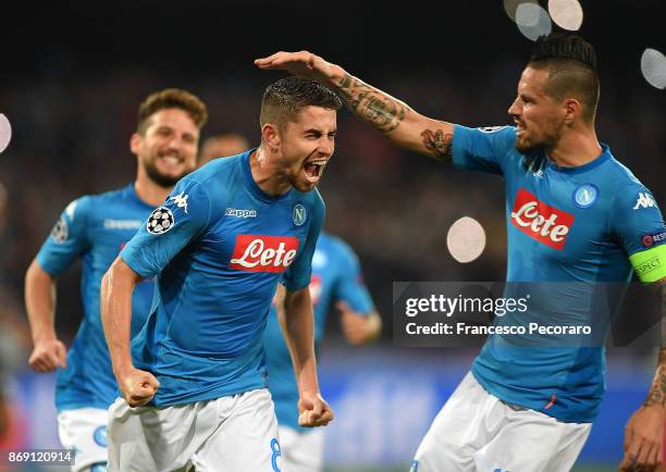 Marek Hamsik and Jorginho of SSC Napoli celebrate the 2-2 goal scored by Jorginho during the UEFA Champions League group F match between SSC Napoli...