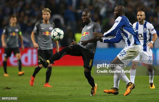 Leipzig midfielder Naby Keita from Guine with FC Porto midfielder Danilo Pereira from Portugal in action during the UEFA Champions League match...