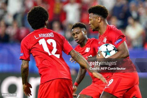 Spartak Moscow's Cape Verdean forward Ze Luis celebrates with teammates after scoring a goal during the UEFA Champions League group E football match...
