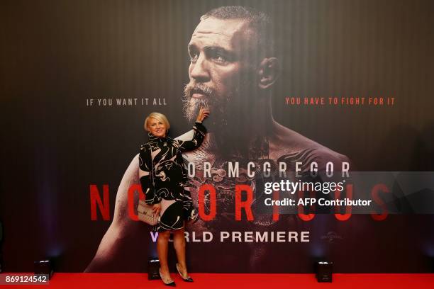 Margaret McGregor, mother of Irish mixed martial arts star Conor McGregor poses upon arrival to attend the world premiere of the documentary film...