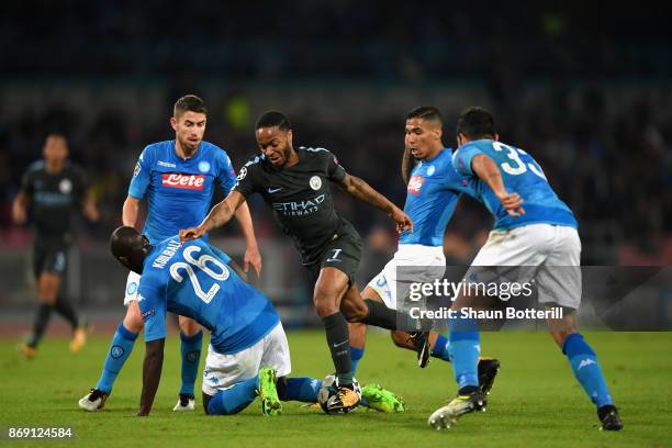 Raheem Sterling of Manchester City attempts to get past the SSC Napoli defence during the UEFA Champions League group F match between SSC Napoli and...