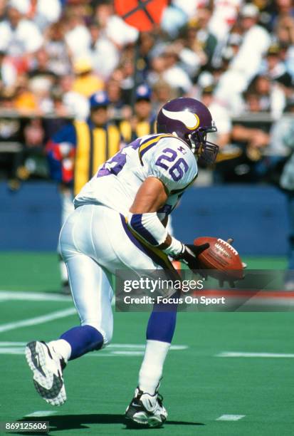 Robert Smith of the Minnesota Vikings carries the ball against the Pittsburgh Steelers during an NFL football game September 24, 1995 at Three Rivers...