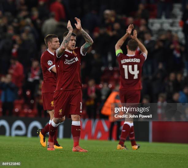 Alberto Moreno of Liverpool shows his appreciation to the fans at the end of the UEFA Champions League group E match between Liverpool FC and NK...