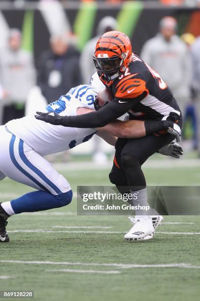 Jeremy Hill of the Cincinnati Bengals runs the football upfield during the game against the Indianapolis Colts at Paul Brown Stadium on October 29,...