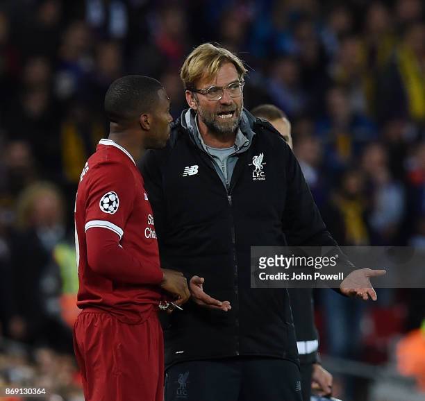 Jurgen Klopp manager of Liverpool talking with Daniel Sturridge during the UEFA Champions League group E match between Liverpool FC and NK Maribor at...