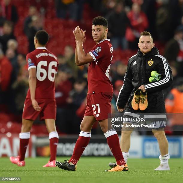 Alex Oxlade-Chamberlain of Liverpool shows his appreciation to the fans at the end of the UEFA Champions League group E match between Liverpool FC...