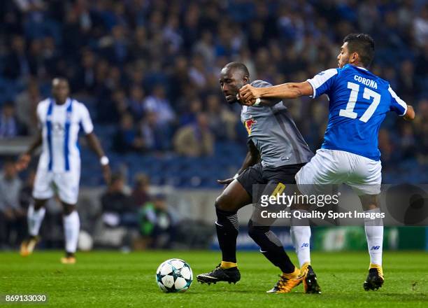 Naby Keita of RB Leipzig is challenged by Jesus Corona of FC Porto during the UEFA Champions League group G match between FC Porto and RB Leipzig at...