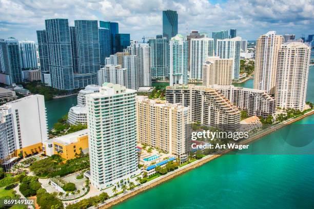 miami's brickell key aerial - brickell miami stock pictures, royalty-free photos & images