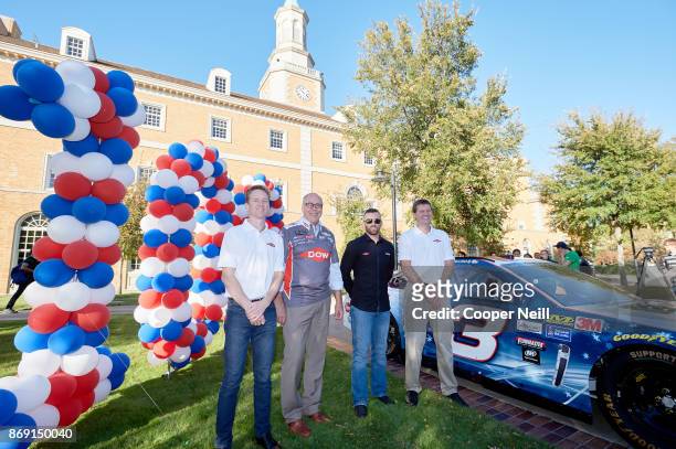 Gordy Sheer, Neal Smatresk, Austin Dillon and Sam Crabtree unveil the new DOW 2018 Winter Olympic paint scheme at the University of North Texas on...