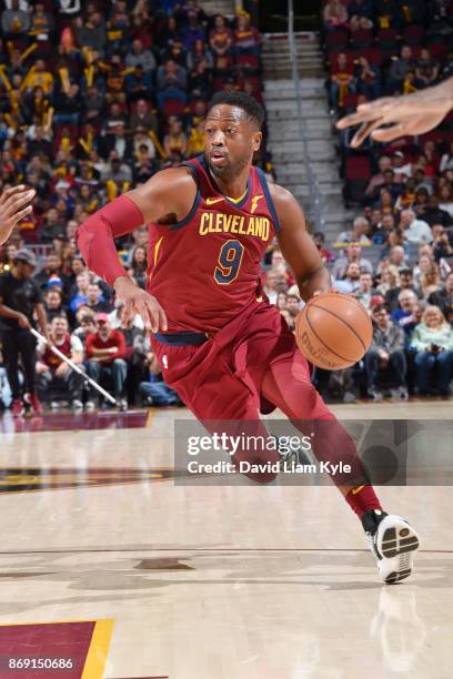 Dwyane Wade of the Cleveland Cavaliers handles the ball against the Indiana Pacers on November 1, 2017 at Quicken Loans Arena in Cleveland, Ohio....