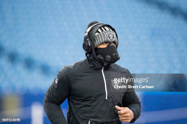 DeAndre Washington of the Oakland Raiders warms up before the game against the Buffalo Bills at New Era Field on October 29, 2017 in Orchard Park,...