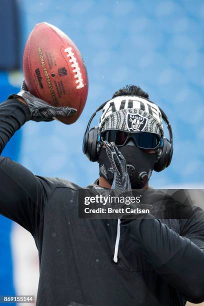 DeAndre Washington of the Oakland Raiders warms up before the game against the Buffalo Bills at New Era Field on October 29, 2017 in Orchard Park,...