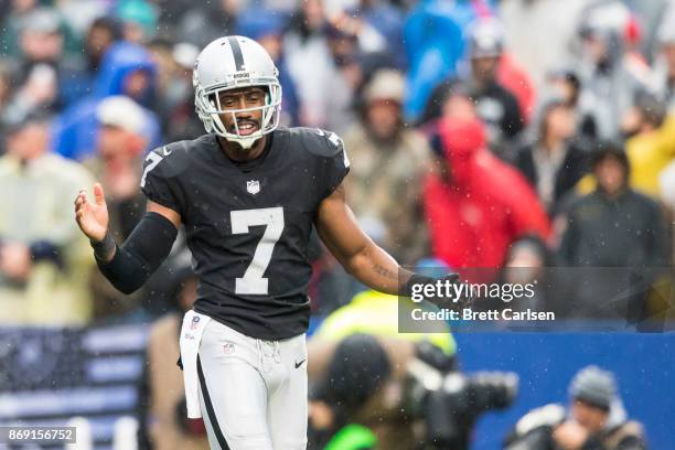 Marquette King of the Oakland Raiders claps his hands as he runs out to punt the ball during the game against the Buffalo Bills at New Era Field on...