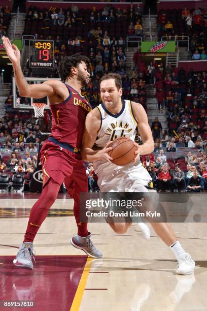 Bojan Bogdanovic of the Indiana Pacers handles the ball against the Cleveland Cavaliers on November 1, 2017 at Quicken Loans Arena in Cleveland,...
