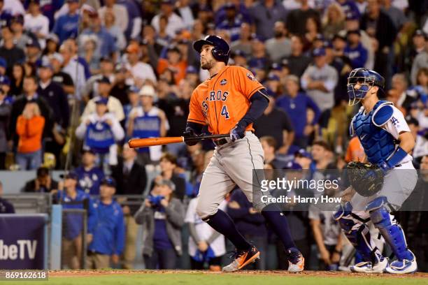 George Springer of the Houston Astros reacts after hitting a two-run home run during the second inning against the Los Angeles Dodgers in game seven...