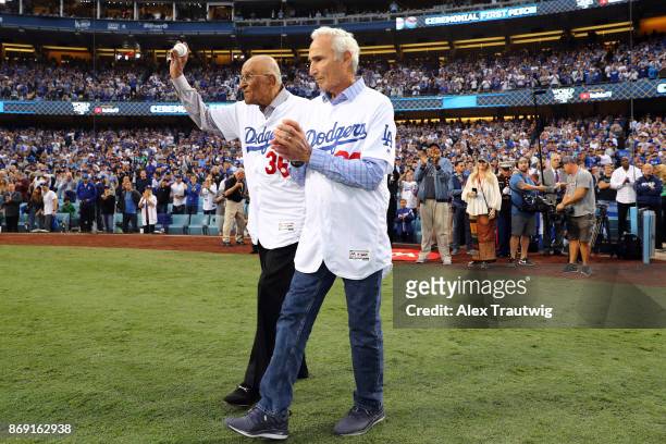 Hall of Famer Sandy Koufax and Dodgers legend Don Newcombe take the field for the ceremonial first pitch prior to Game 7 of the 2017 World Series...