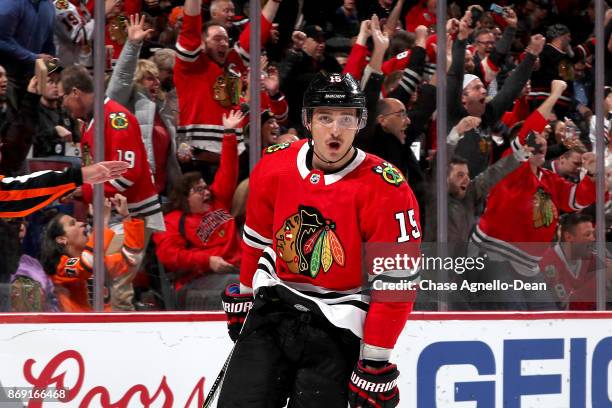 Artem Anisimov of the Chicago Blackhawks reacts after scoring against the Philadelphia Flyers in the second period at the United Center on November...