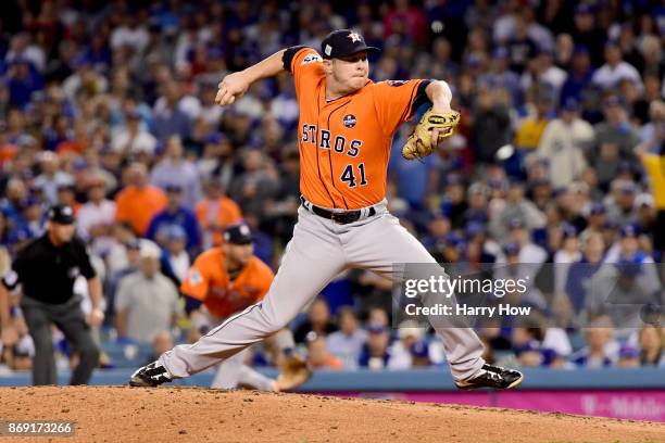Brad Peacock of the Houston Astros throws a pitch during the third inning against the Los Angeles Dodgers in game seven of the 2017 World Series at...