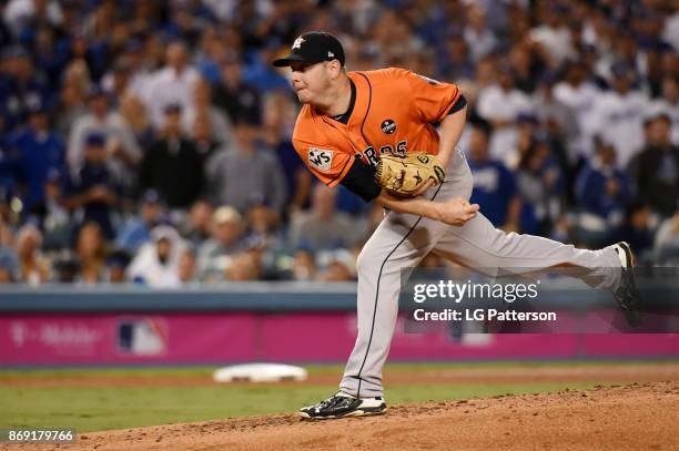 Brad Peacock of the Houston Astros pitches during Game 7 of the 2017 World Series against the Los Angeles Dodgers at Dodger Stadium on Wednesday,...