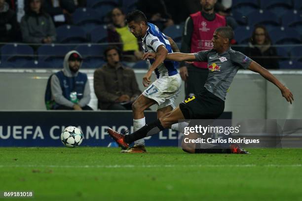 Leipzig defender Bernardo Junior from Brasil tackles FC PortoÕs forward Jesus Corona from Mexico during the match between FC Porto v RB Leipzig or...