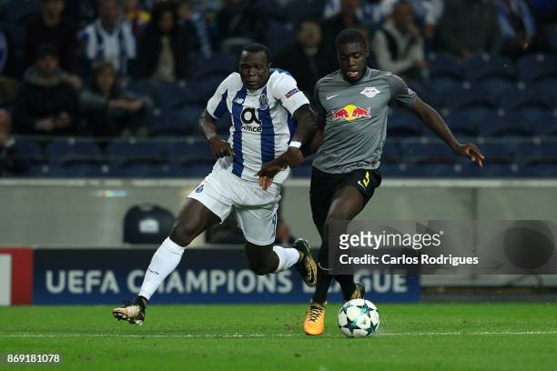 PortoÕs forward Vincent Aboubakar from Camaroes vies with Leipzig defender Dayot Upamecano from France for the ball possession during the match...