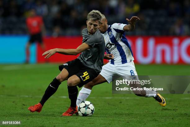 Leipzig midfielder Kevin Kampl from Slovenia vies with FC PortoÕs forward Yacine Brahimi from Algeria for the ball possession during the match...