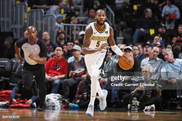 Will Barton of the Denver Nuggets handles the ball against the Toronto Raptors on November 1, 2017 at the Pepsi Center in Denver, Colorado. NOTE TO...