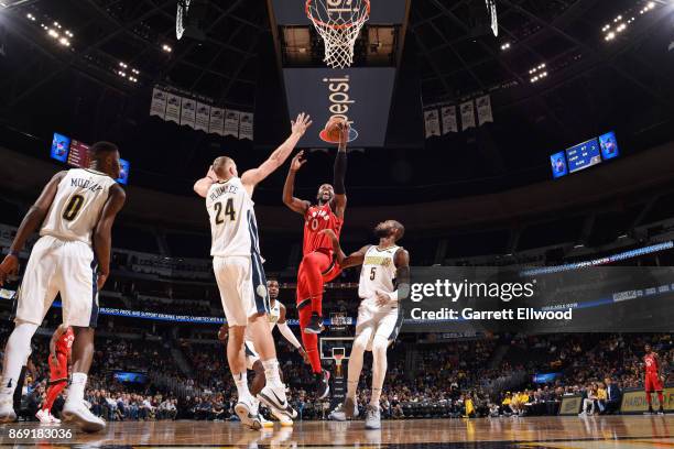 Miles of the Toronto Raptors drives to the basket against the Denver Nuggets on November 1, 2017 at the Pepsi Center in Denver, Colorado. NOTE TO...