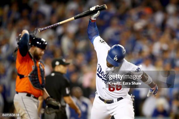 Yasiel Puig of the Los Angeles Dodgers reacts after lining out during the fifth inning against the Houston Astros in game seven of the 2017 World...