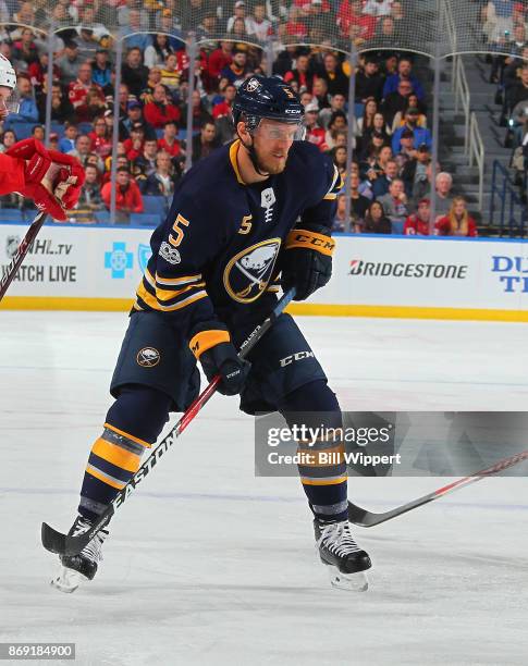 Matt Tennyson of the Buffalo Sabres skates against the Detroit Red Wings during an NHL game on October 24, 2017 at KeyBank Center in Buffalo, New...