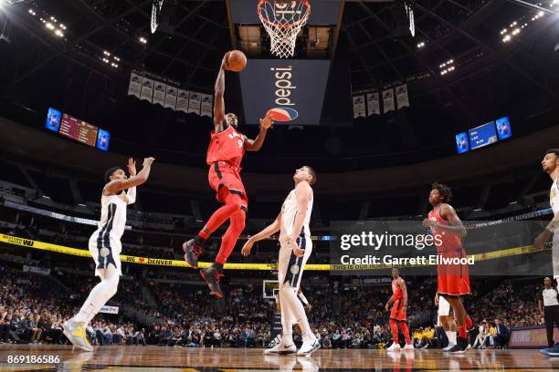 Serge Ibaka of the Toronto Raptors drives to the basket against the Denver Nuggets on November 1, 2017 at the Pepsi Center in Denver, Colorado. NOTE...