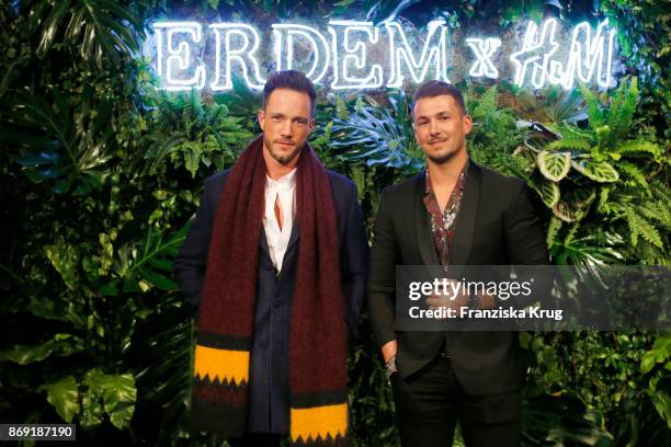 Daniel Fox and Sandro Rasa wearing ERDEM X H&M attend the ERDEM x H&M Pre-Shopping Event on November 1, 2017 in Berlin, Germany.