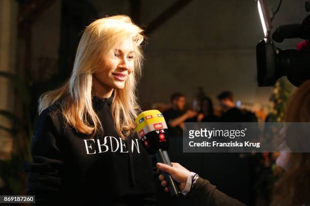 Model Mandy Bork wearing ERDEM X H&M attends the ERDEM x H&M Pre-Shopping Event on November 1, 2017 in Berlin, Germany.