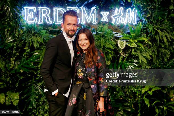 Thorsten Mindermann and actress Hannah Herzsprung wearing ERDEM X H&M attend the ERDEM x H&M Pre-Shopping Event on November 1, 2017 in Berlin,...