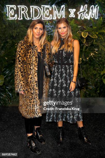 Influencers Aylin Koenig and Xenia van der Woodsen wearing ERDEM X H&M attend the ERDEM x H&M Pre-Shopping Event on November 1, 2017 in Berlin,...