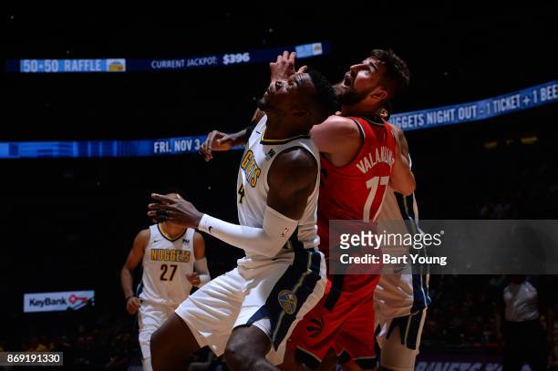 Paul Millsap of the Denver Nuggets and Jonas Valanciunas of the Toronto Raptors await the ball during the game on November 1, 2017 at the Pepsi...