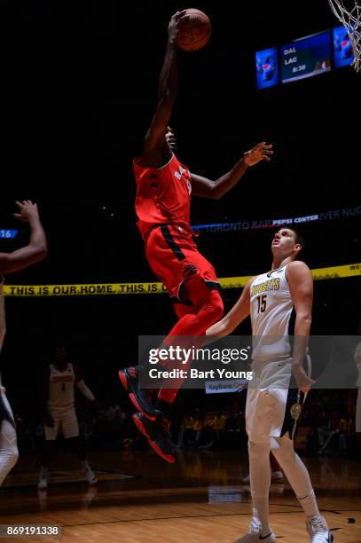 Serge Ibaka of the Toronto Raptors drives to the basket against the Denver Nuggets on November 1, 2017 at the Pepsi Center in Denver, Colorado. NOTE...