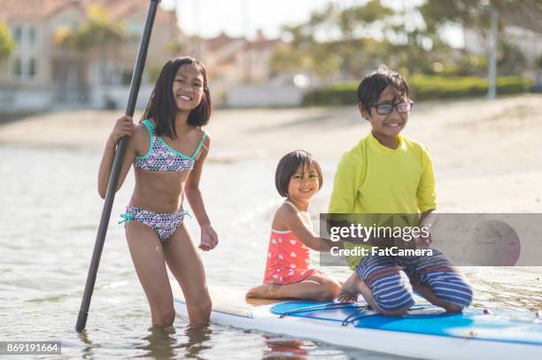 https://media.gettyimages.com/id/869191664/photo/filipino-family-enjoying-a-day-at-the-beach.jpg?s=612x612&w=gi&k=20&c=kTYQkXQ4Sgi5wjev5vGRhrfV173m2WkUSgppdRoLglQ=