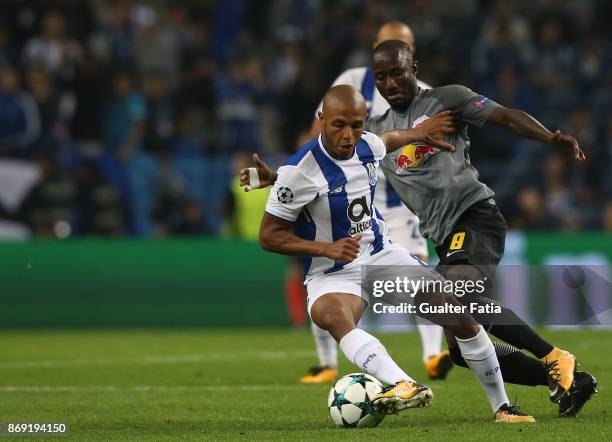 Porto forward Yacine Brahimi from Algeria with RB Leipzig midfielder Naby Keita from Guine in action during the UEFA Champions League match between...