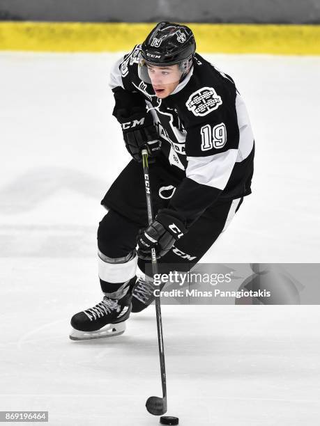 Alex Barre-Boulet of the Blainville-Boisbriand Armada skates the puck against the Drummondville Voltigeurs during the QMJHL game at Centre...