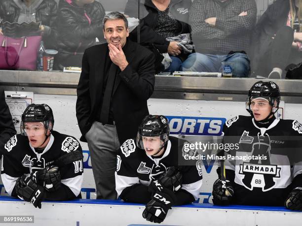 Head coach of the Blainville-Boisbriand Armada Joel Bouchard looks on from behind the bench against the Drummondville Voltigeurs during the QMJHL...