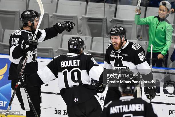 Pascal Corbeil of the Blainville-Boisbriand Armada celebrates his goal in the second period with teammates against the Drummondville Voltigeurs...