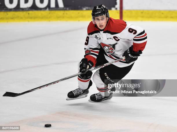 Nicolas Guay of the Drummondville Voltigeurs skates the puck against the Blainville-Boisbriand Armada during the QMJHL game at Centre d'Excellence...